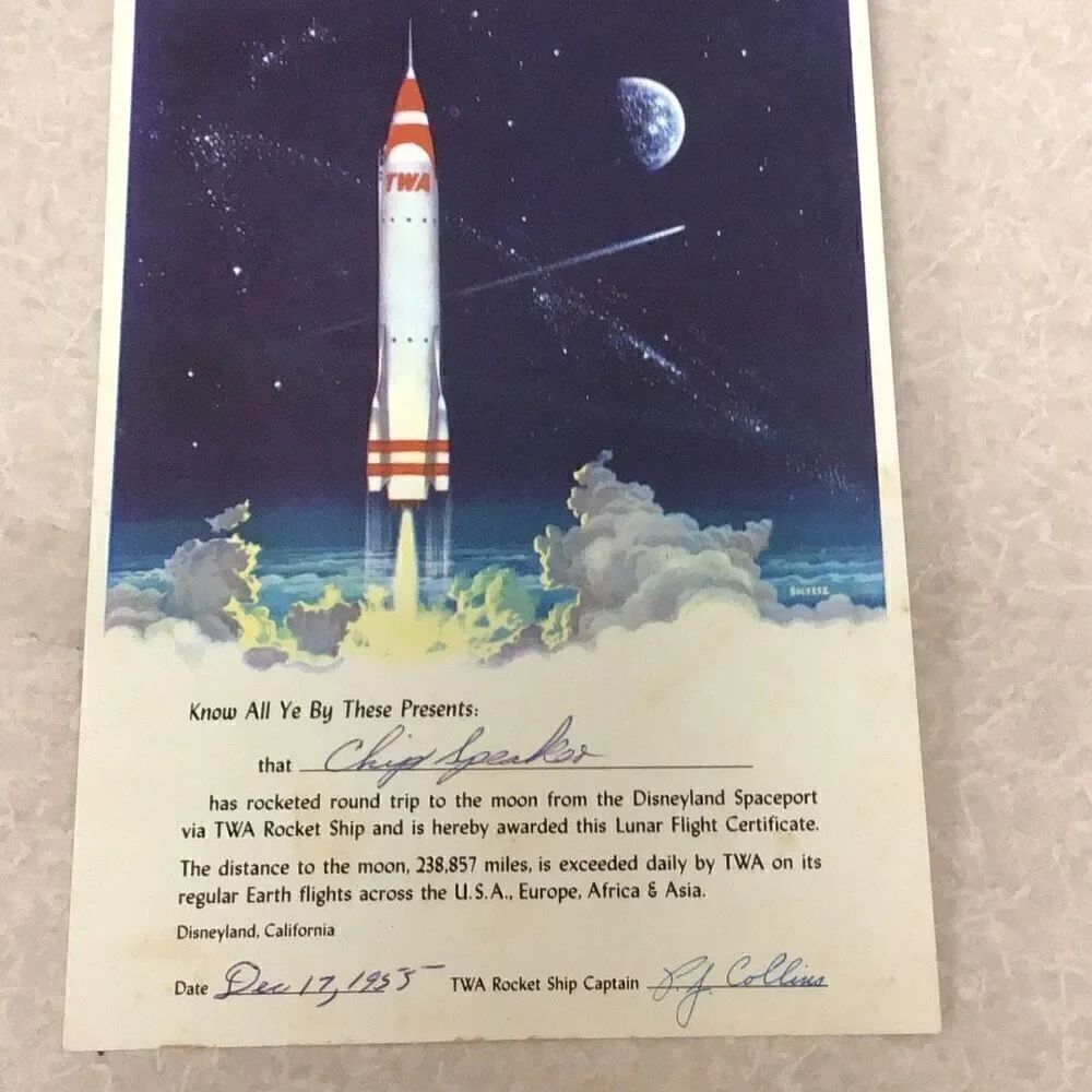 Vintage 1956 Disney land, and TWA airlines rocket around the moon certificate.